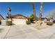 Charming single-story home featuring a well-maintained front yard and an attached two-car garage at 1349 Foxglove Dr, Las Vegas, NV 89142