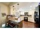 Well-lit kitchen with white cabinets, a peninsula, and stainless steel appliances at 1349 Foxglove Dr, Las Vegas, NV 89142