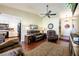 Comfortable living room with hardwood floors, a ceiling fan, and neutral paint at 1349 Foxglove Dr, Las Vegas, NV 89142