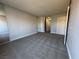 Spacious carpeted bedroom with mirror sliding closet doors at 1460 Hialeah Dr # D, Las Vegas, NV 89119