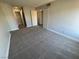 Expansive carpeted living room with doorway views at 1460 Hialeah Dr # D, Las Vegas, NV 89119