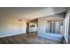 Bright living room features wood-look floors and a large window at 1460 Hialeah Dr # D, Las Vegas, NV 89119