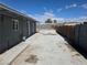 Spacious backyard featuring a large patio area, perfect for outdoor entertaining at 1642 Palma Vista Ave, Las Vegas, NV 89169
