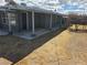 Backyard with covered porch and space for outdoor living and landscaping at 1642 Palma Vista Ave, Las Vegas, NV 89169