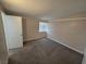 Neutral bedroom with carpet, white trim, and a window with blinds at 1642 Palma Vista Ave, Las Vegas, NV 89169