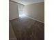 Bedroom features a window and neutral walls and carpet at 1642 Palma Vista Ave, Las Vegas, NV 89169