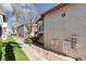 Exterior view of an apartment building with stair access, grassy areas, and clean walkways at 1701 E Katie Ave # 57, Las Vegas, NV 89119