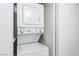 In-unit laundry area showcasing a stacked washer and dryer at 1701 E Katie Ave # 57, Las Vegas, NV 89119