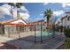 Community pool area surrounded by a black fence, offering a secure and inviting space at 1701 E Katie Ave # 57, Las Vegas, NV 89119