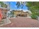 Expansive backyard featuring a pool, patio, and ample space for outdoor activities at 1904 Chapman Dr, Las Vegas, NV 89104
