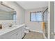 Updated bathroom with a glass-enclosed shower and a modern vanity at 1904 Chapman Dr, Las Vegas, NV 89104