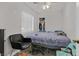 Bedroom with a window, open closet, and a fan at 1904 Chapman Dr, Las Vegas, NV 89104