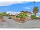 Charming home with a two-story design and mature palm trees at 1904 Chapman Dr, Las Vegas, NV 89104