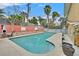 Inviting swimming pool with concrete deck, adjacent to the house for easy access and summer enjoyment at 1904 Chapman Dr, Las Vegas, NV 89104
