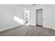 Bedroom features plush carpet, white walls, and a sliding door closet with shelving at 2160 Point Mallard Dr, Henderson, NV 89012