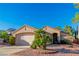 Charming single-story home with a two car garage and desert landscaping at 2160 Point Mallard Dr, Henderson, NV 89012