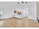 Bright, open-concept living area featuring hardwood floors and access to a modern kitchen at 2160 Point Mallard Dr, Henderson, NV 89012