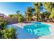 Private pool with mature landscaping, charming fountain, and clear blue water create a backyard oasis at 2160 Point Mallard Dr, Henderson, NV 89012