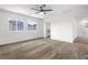 Large bedroom with lots of light, carpet, a ceiling fan, and large closet at 2205 Stone Well Rd, North Las Vegas, NV 89031