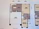 Floor plan of the main level featuring a kitchen, great room, 2-bay garage, and den/bedroom 4 at 2205 Stone Well Rd, North Las Vegas, NV 89031