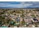 Sprawling neighborhood boasts mature landscaping, mountain views, and sparkling pools, creating a peaceful and inviting setting at 2287 Moresca Ave, Henderson, NV 89052
