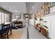 Spacious living area with tile flooring, a piano and stylish decor at 2287 Moresca Ave, Henderson, NV 89052