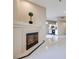 A fireplace accents the living area which features tile flooring and high ceilings at 2305 W Horizon Ridge Pkwy # 514, Henderson, NV 89052