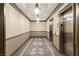 Interior hallway with elevators, carpet, and recessed lighting at 2405 W Serene Ave # 631, Las Vegas, NV 89123