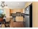 The open kitchen features stainless steel appliances and ample cabinet space at 2405 W Serene Ave # 631, Las Vegas, NV 89123