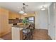 Well-equipped kitchen featuring granite countertops, stainless steel appliances, and a convenient breakfast bar at 2405 W Serene Ave # 631, Las Vegas, NV 89123