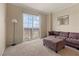 Inviting living room featuring a large sliding glass door with great views and comfortable seating at 2405 W Serene Ave # 631, Las Vegas, NV 89123