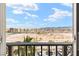 Scenic view from the balcony showcasing a vibrant cityscape, the desert landscape, and mountains at 2405 W Serene Ave # 631, Las Vegas, NV 89123