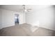 Bedroom featuring neutral carpet and doorways to the hall at 2430 Old Forge Ln # 106, Las Vegas, NV 89121