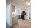 Kitchen features stainless steel appliances, gray cabinets, and sleek countertops at 2430 Old Forge Ln # 106, Las Vegas, NV 89121