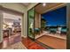 Cozy bedroom with access to a private patio and stunning city views at 2824 Soaring Peak Ave, Henderson, NV 89052