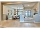 Inviting dining room with tile floors, decorative lighting, and direct access to the home's entry creating a seamless flow at 2824 Soaring Peak Ave, Henderson, NV 89052