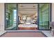 Spacious living room with hardwood floors and seamless indoor/outdoor living at 2824 Soaring Peak Ave, Henderson, NV 89052