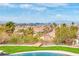 Stunning pool view showcasing the city skyline and mountains in the distance at 2824 Soaring Peak Ave, Henderson, NV 89052