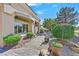 Well-maintained backyard with stone path, greenery, and manicured bushes at 2905 Haddon Dr, Las Vegas, NV 89134