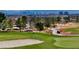 Picturesque golf course view featuring lush greens, sand traps, and manicured landscaping at 2905 Haddon Dr, Las Vegas, NV 89134