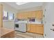 Clean laundry room features modern washer and dryer with storage above and to the side at 2905 Haddon Dr, Las Vegas, NV 89134