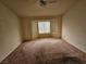 View of the bedroom with a large window, offering ample natural light at 3100 Gladstone Ct, Las Vegas, NV 89134