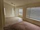 Inviting living room area with large windows, providing plenty of natural light at 3100 Gladstone Ct, Las Vegas, NV 89134