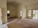 Spacious living room featuring a sliding door to the backyard and an open layout at 3100 Gladstone Ct, Las Vegas, NV 89134