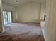 Bright living room with a sliding glass door to the patio, providing ample natural light at 3100 Gladstone Ct, Las Vegas, NV 89134