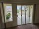 Living room featuring sliding glass doors that lead to an outdoor patio at 3100 Gladstone Ct, Las Vegas, NV 89134