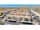 Stunning aerial view of a residential community with well-maintained landscaping and ample parking at 3125 N Buffalo Dr # 1136, Las Vegas, NV 89128