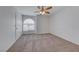 Bedroom featuring carpet, ceiling fan, and a window bringing in lots of natural light at 3125 N Buffalo Dr # 1136, Las Vegas, NV 89128
