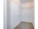 Walk-in closet featuring carpet and wire shelving at 3125 N Buffalo Dr # 1136, Las Vegas, NV 89128