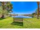 Serene lake view from a park bench, providing a peaceful setting and beautiful scenery at 3125 N Buffalo Dr # 1136, Las Vegas, NV 89128